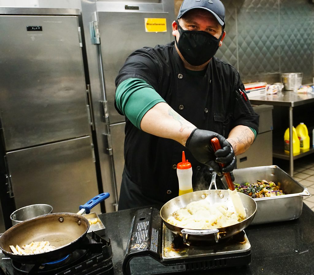 Chef Rameriez cooks cauliflower steak