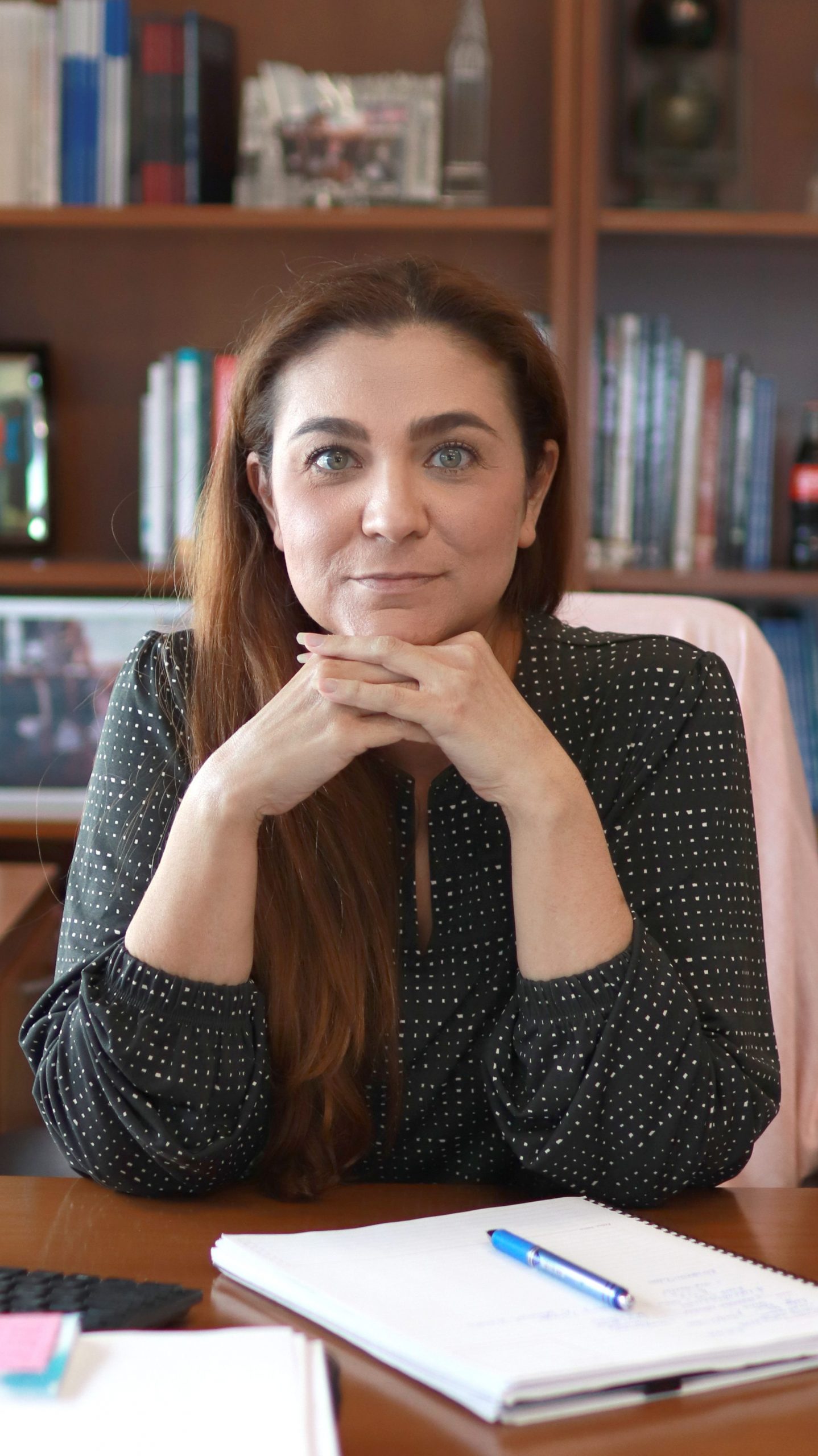 Dean Claudia San Miguel in her office in the AIC.