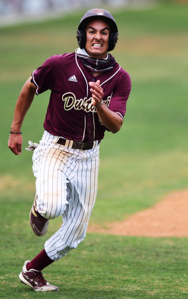 TAMIU runner heads home to score a run