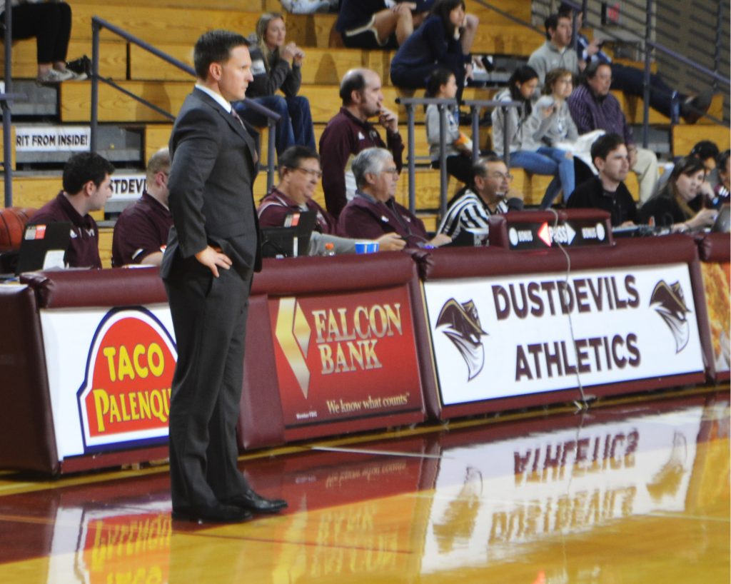 Coach Nate Vogel watches a play in a file photo from 2020