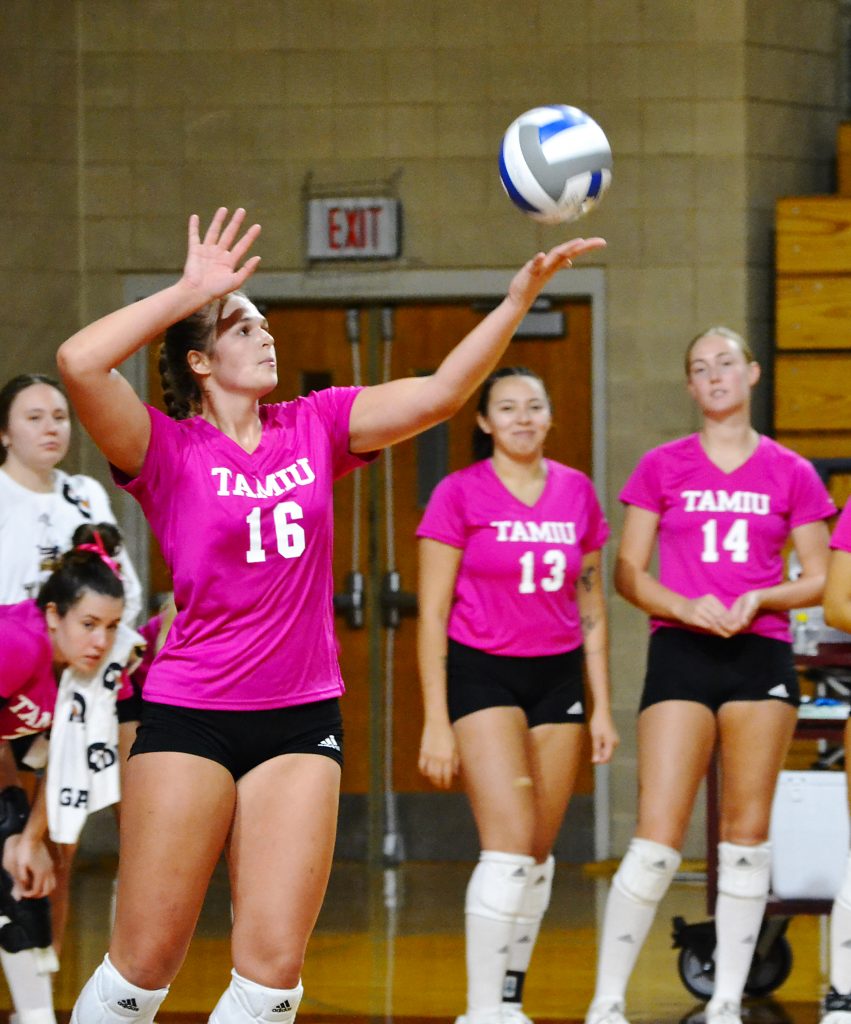 Pink breast cancer awareness jerseys for TAMIU volleyball