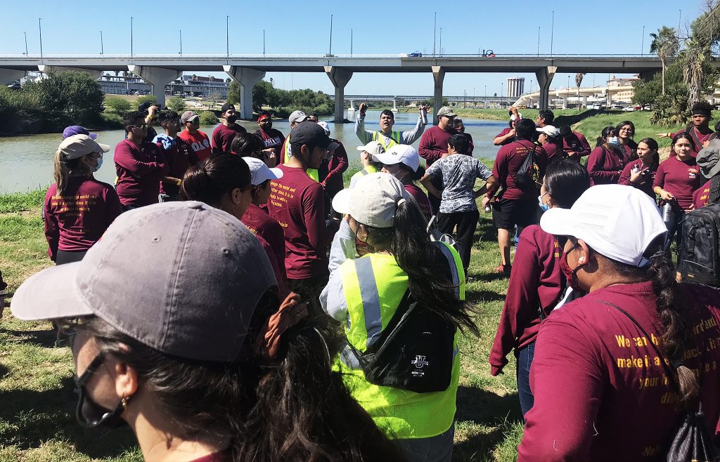 A crowd gathers to get instructions for Make a Difference Day.