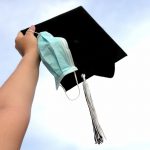 One student is ready for graduation with their cap and tassle