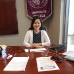 Dean Barbara Hong at her office desk