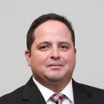 Golf coach Rudy Gonzalez
