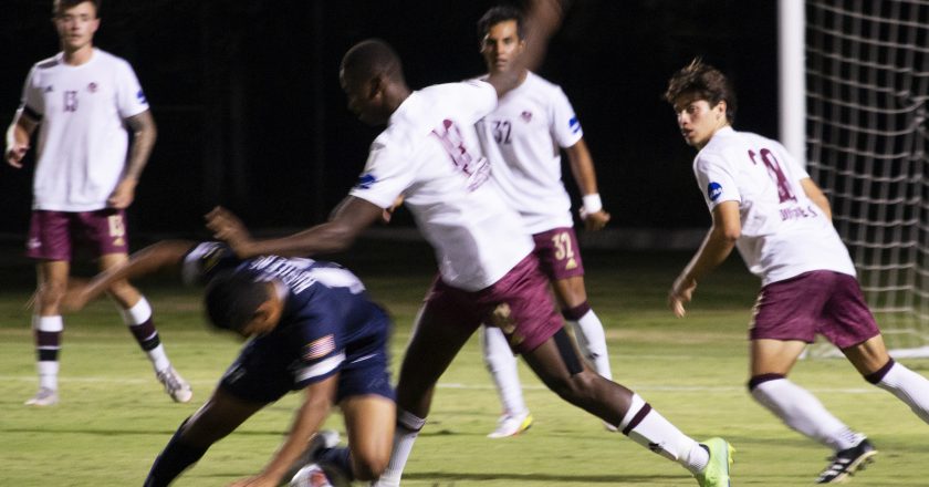 Men win first soccer game of season