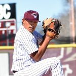 baseball pitcher Christopher Sauceda winds up.