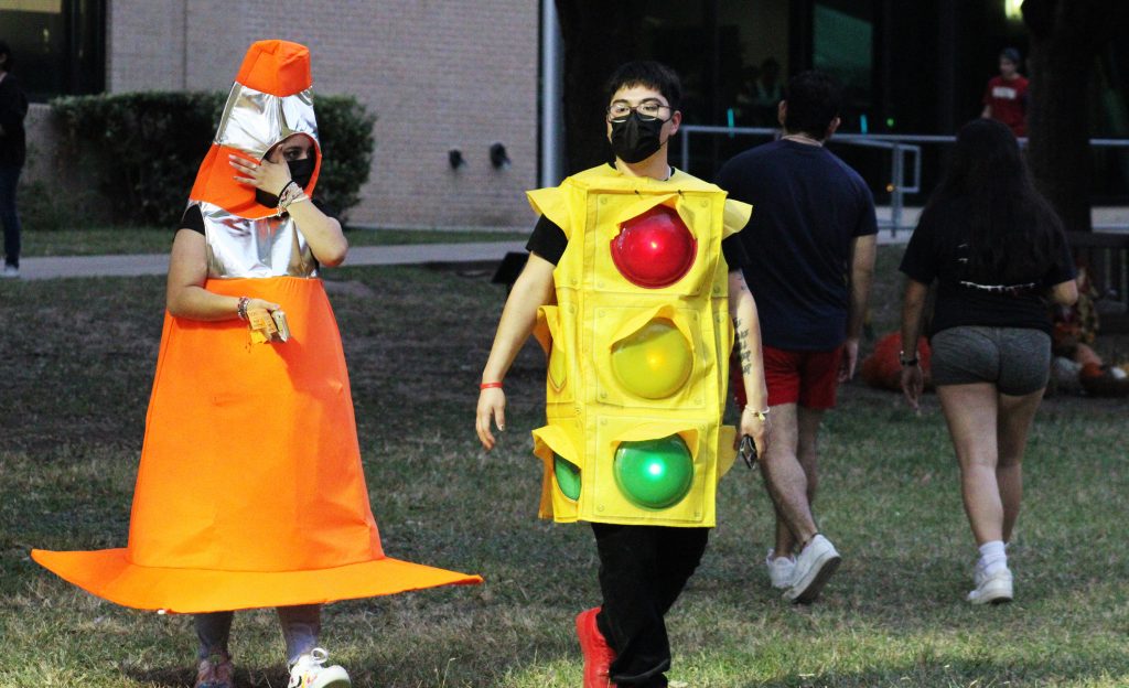 Students dressed as a traffic cone and a traffic light.