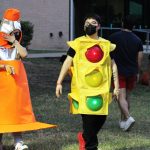 Students dressed as a traffic cone and a traffic light.