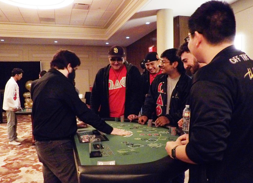 Students play table games at CABsino