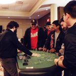 Students play table games at CABsino
