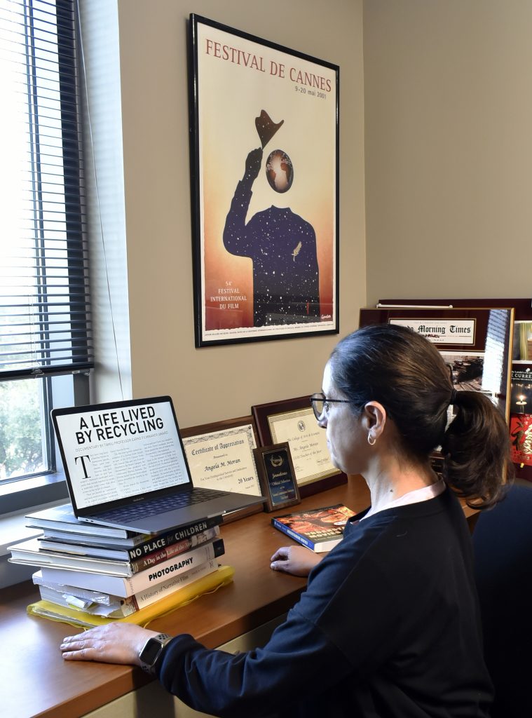 Professor Moran works in her office.