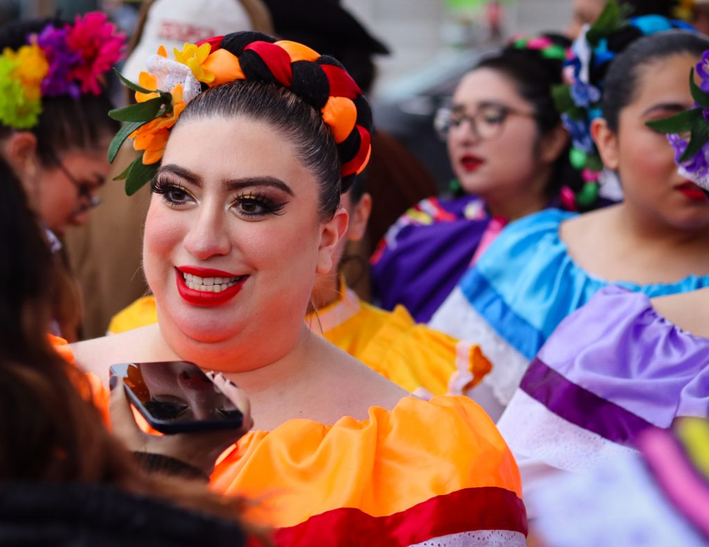 Ballet Folklorico dancers meet and greet at the event.