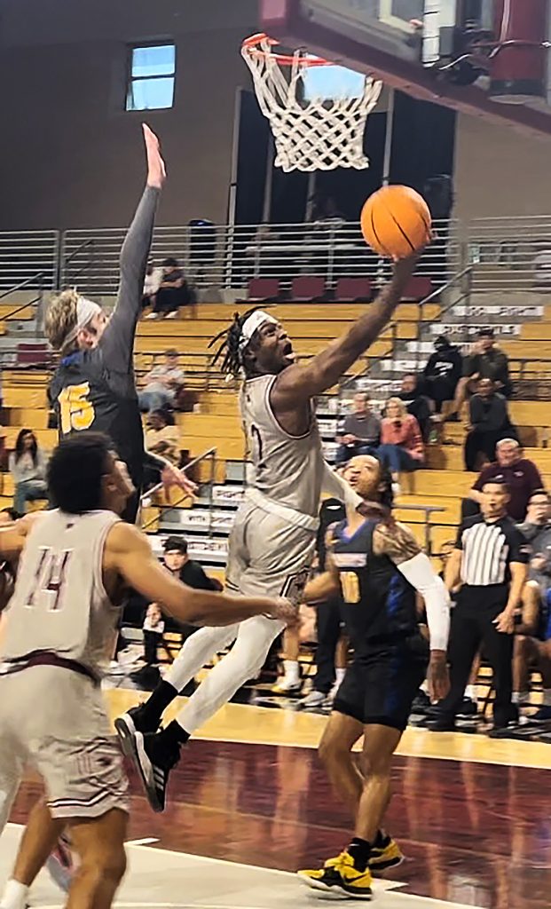 TAMIU basketball action