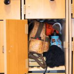 Photo Illustration of an overfilled locker in the Center for the Fine and Performing Arts.
