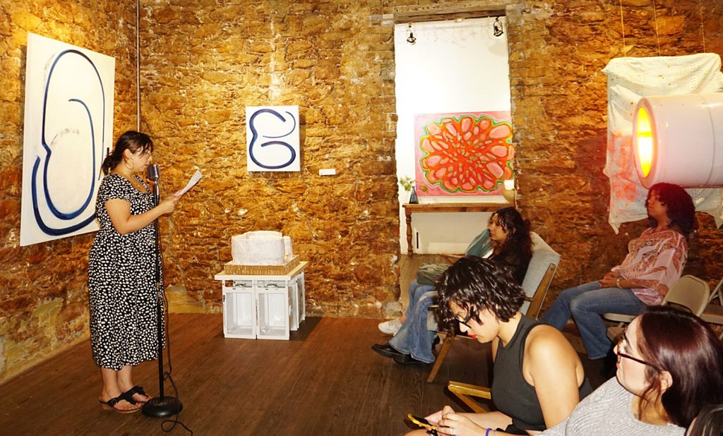 Reading Unsent Letters during a The Rivergull Journal event.