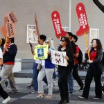 TAMIU students and Laredo community members protest President Donald Trump's DEI and immigration policies.