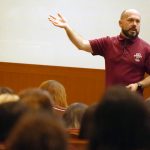 SOLE Director Nicholas Hudson gestures while speaking to student organization leaders.