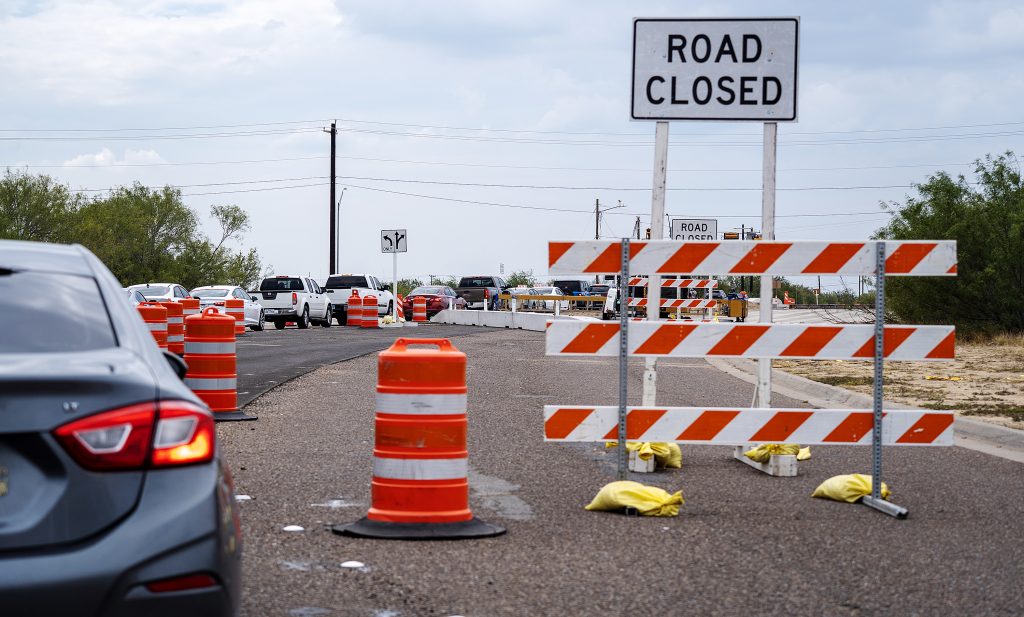 Traffic congestion at the main campus entrance due to construction.