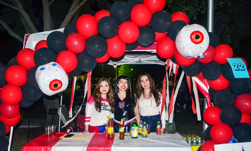 Students pose for a photo at Halloween Fest.