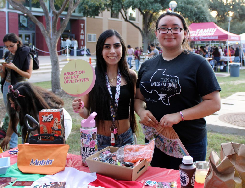 People pose for a photo.