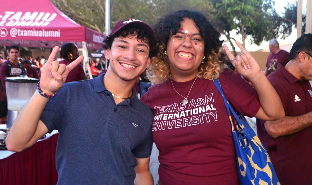People pose for a photo.