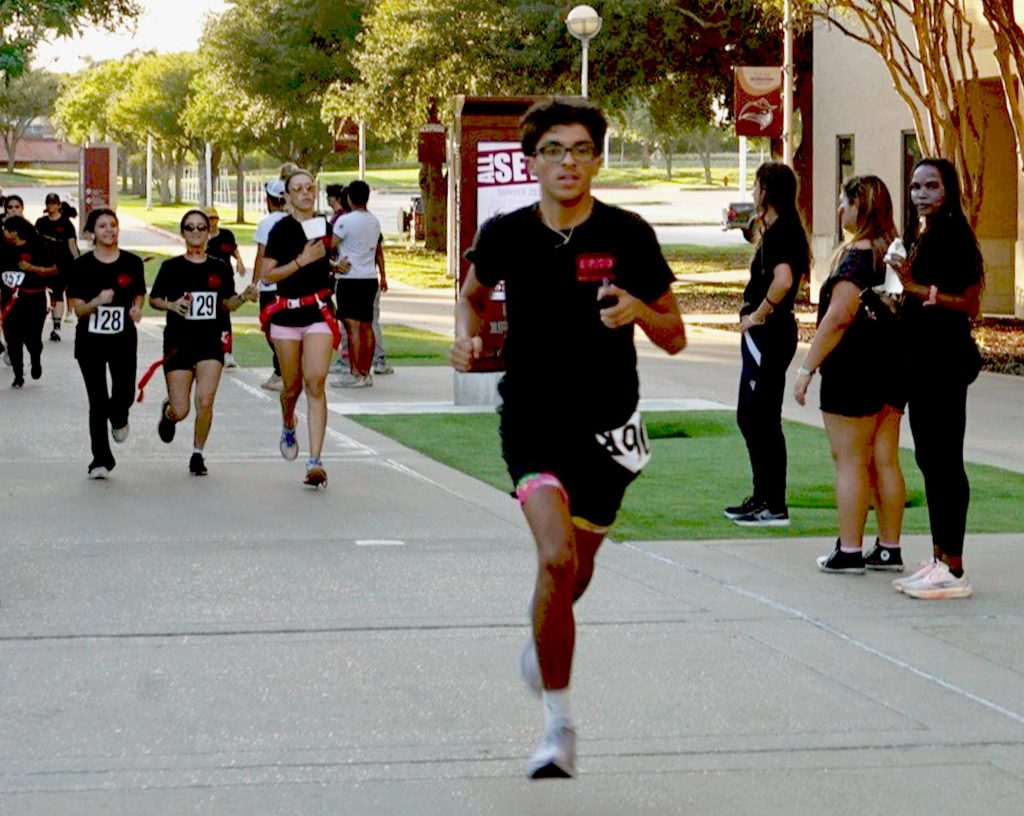 Runners compete in the Zombie Run 5K.